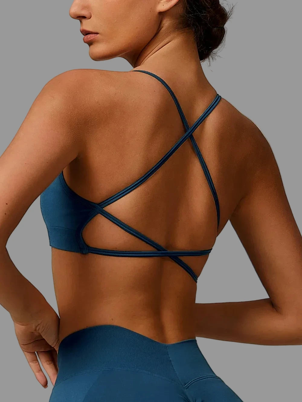 Top deportivo SEAMLESS ORIX VD – Azul petróleo